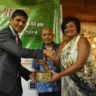 Young Entrepreneur of the Year - Ms Tadulala Tuinamoala receiving her Award from Mr Shaheen Ali the Permanent Secretary for Industry, Trade and Tourism and Mr Saud Minam, the ANZ Fiji Country Head