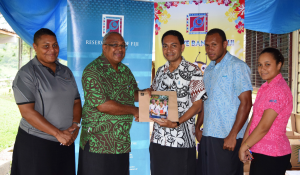 Assistant Principle of Dawasamu Secondary School, Mr Ifereimi Tuiwainunu (3rd from left) receives the 2015 Student Diary from RBF’s Chief Manager Financial System Development, Mr Vereimi Levula (2nd from left) 